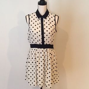 Black and cream polka dot knee length dress